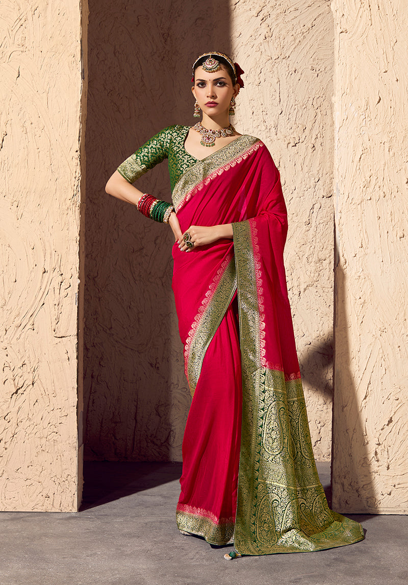 Classic red crepe georgette saree featuring intricate gold zari weaving work