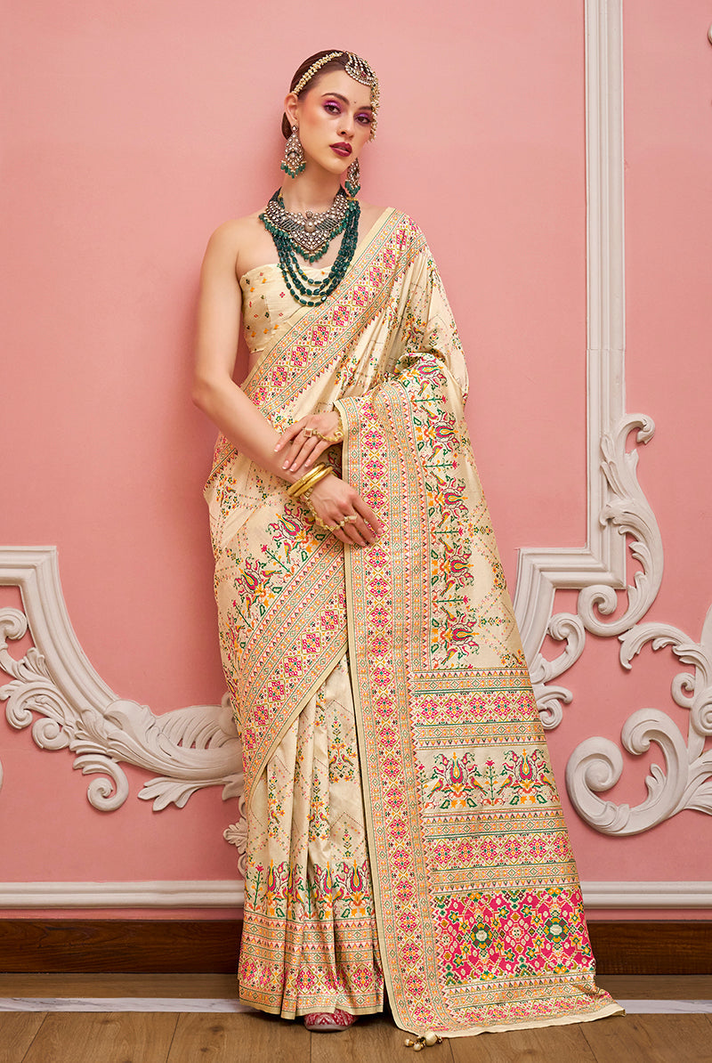Cream Banarasi silk saree with detailed Meenakari weaving patterns