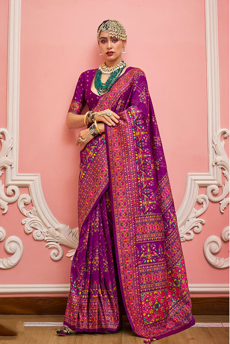 Dark magenta Banarasi silk saree with intricate meenakari and traditional weaving work