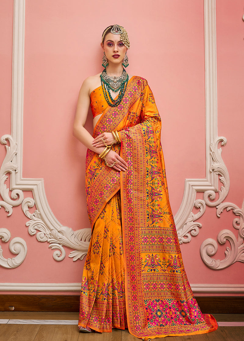 Orange Banarasi silk saree with traditional Meenakari and golden weaving work
