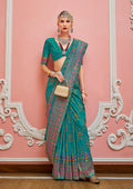 Teal Banarasi silk saree with detailed Meenakari and golden weaving work