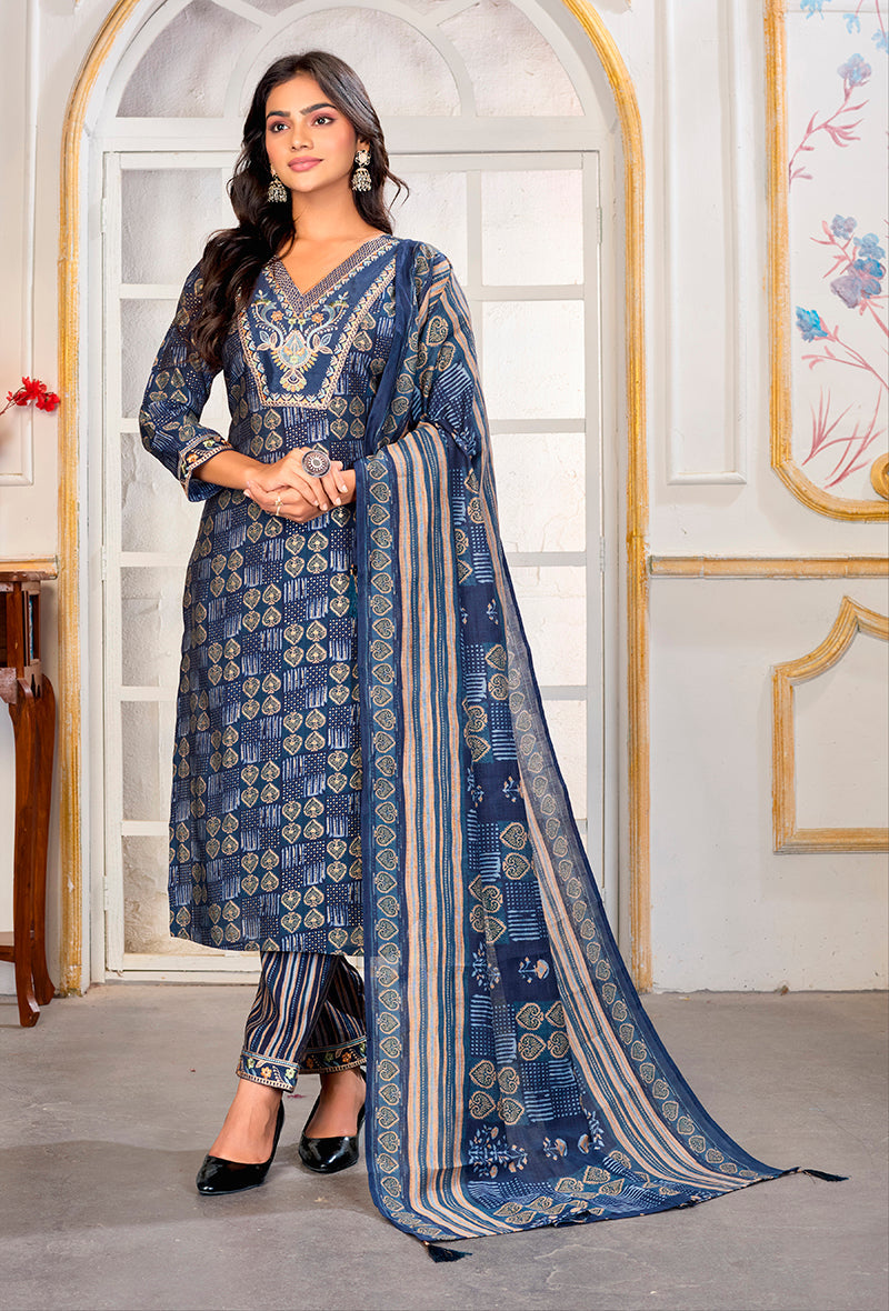 A blue Chanderi pant style suit featuring intricate embroidery, perfect for festive occasions.