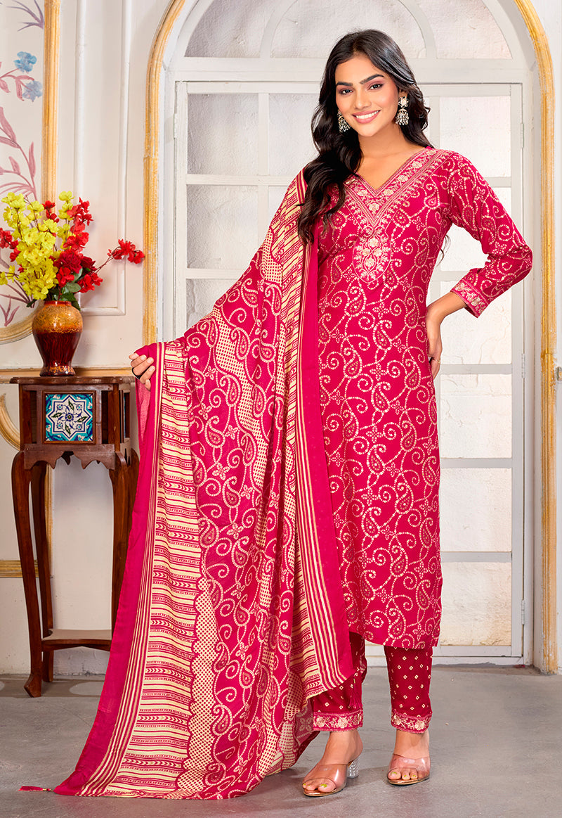 A stylish pink rayon printed party wear pant style suit with embroidered details and matching dupatta.