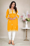 Mustard yellow georgette kurti with intricate embroidery details for casual ethnic styling