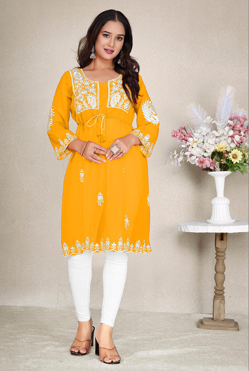 Mustard yellow georgette kurti with intricate embroidery details for casual ethnic styling