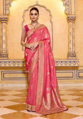 Dark peach faux crepe silk saree with intricate gold zari weaving patterns and matching blouse piece.
