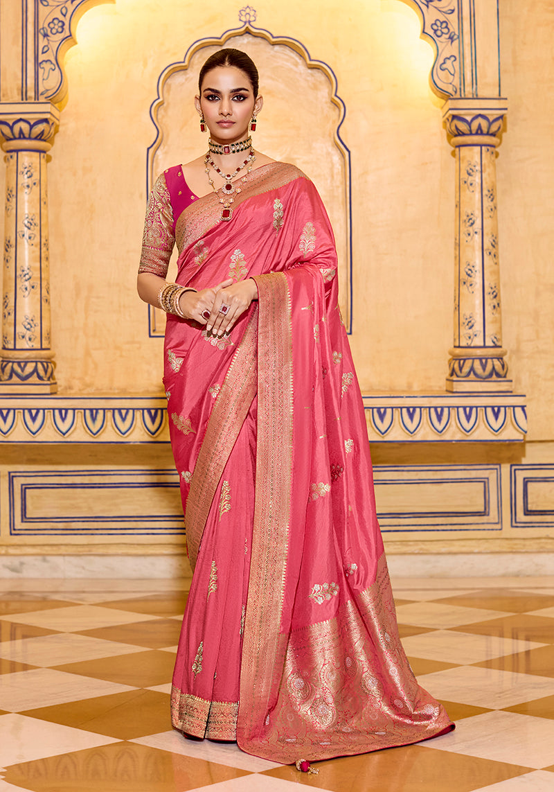 Dark peach faux crepe silk saree with intricate gold zari weaving patterns and matching blouse piece.