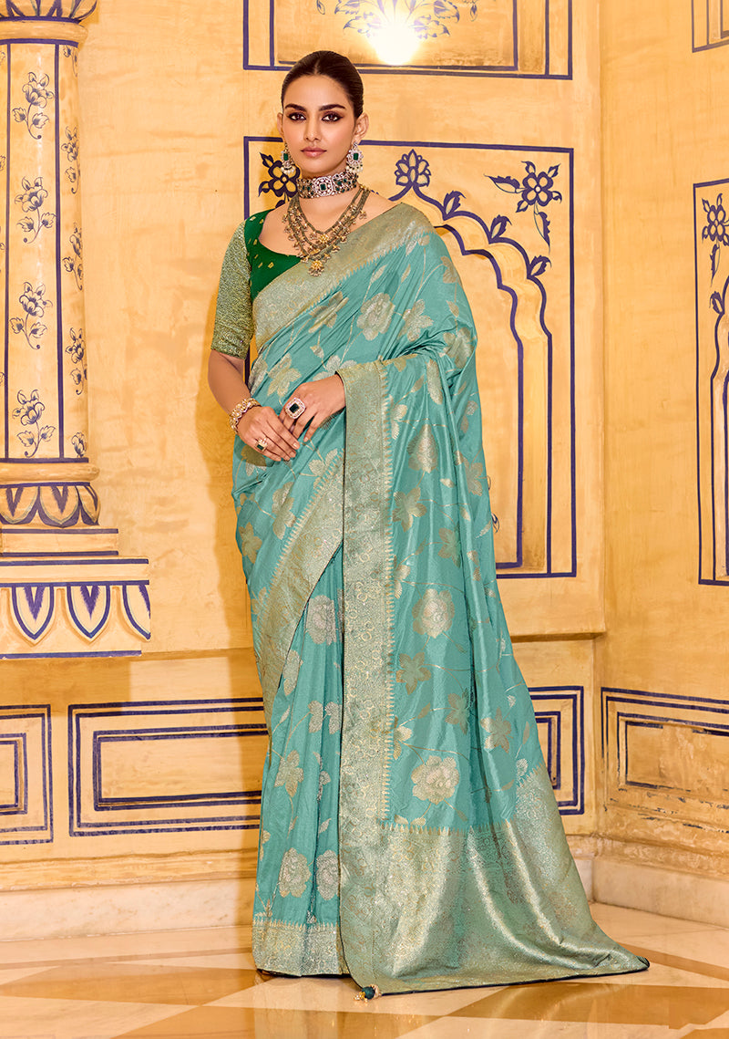 Sea green faux crepe silk saree with elegant Zari weaving details
