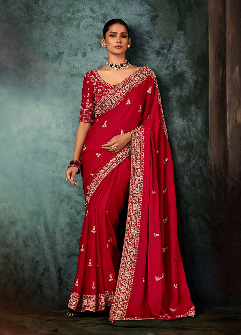 Red bridal saree with heavy border and intricate embroidery