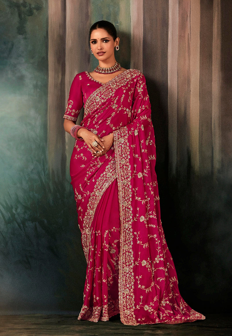 Rani pink faux satin saree with heavy embroidery and border detail
