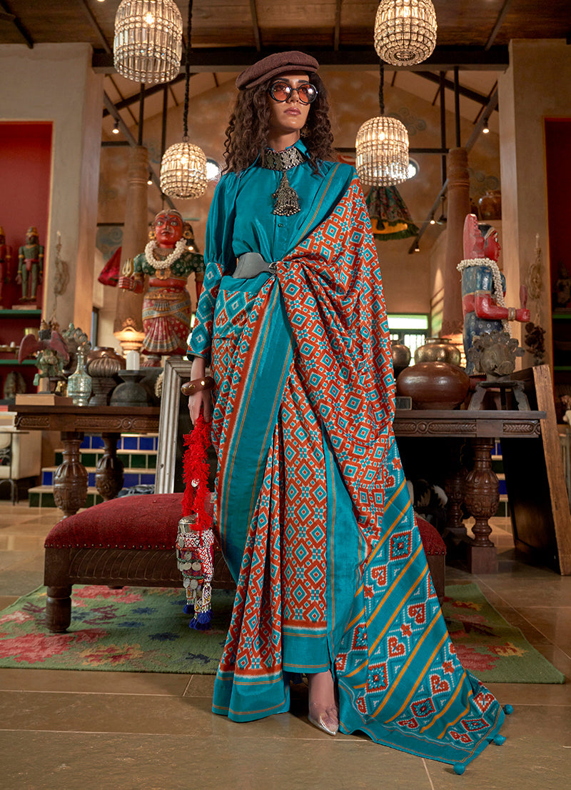 Aqua Blue and Rust silk blend saree with Ikat print and contrast border