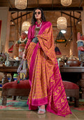 Mustard and Magenta Pink silk blend saree with Ikat print and contrast border.