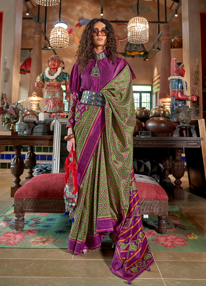 Green and Purple silk blend saree with traditional Ikat print and contrast border