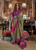 Green and Purple silk blend saree with traditional Ikat print and contrast border