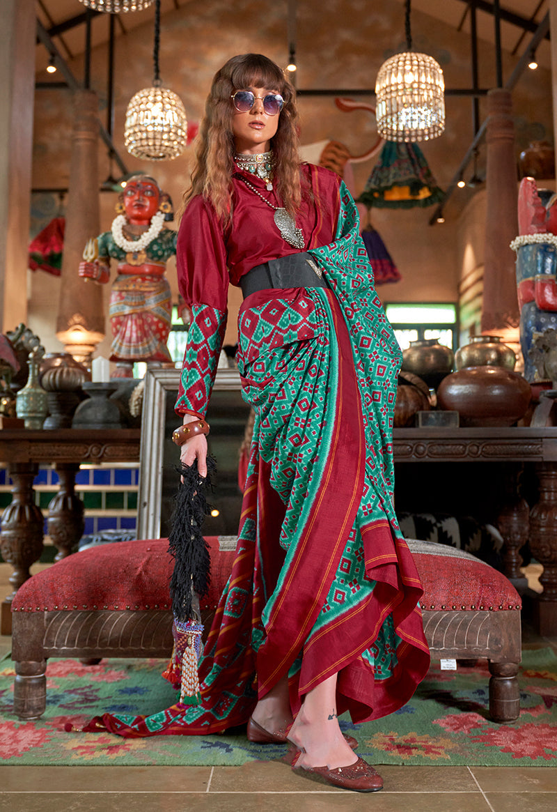 Turquoise and maroon Ikat print silk blend saree with a decorative contrast border