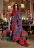 Navy blue and maroon silk blend saree with Ikat print and contrast border