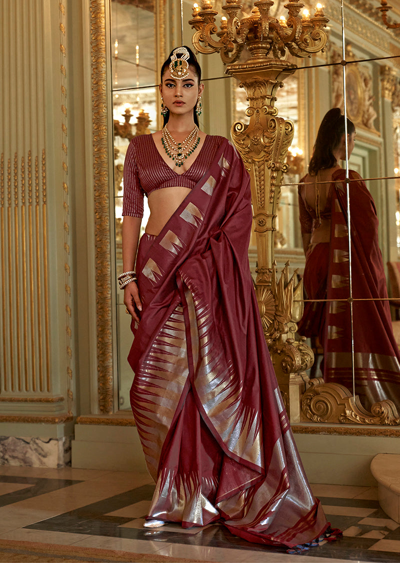 Classic Maroon silk blend saree with detailed traditional weaving work.