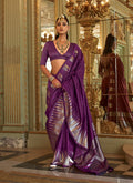 Purple silk blend saree showcasing intricate traditional weaving patterns.