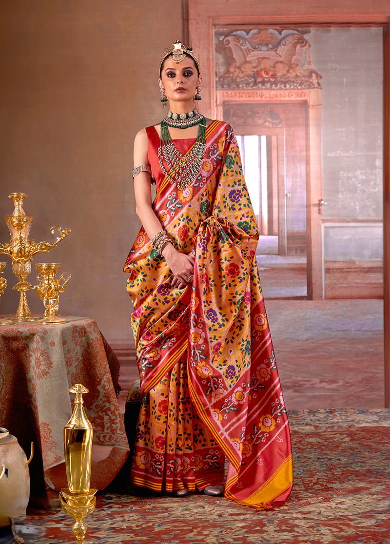 Yellow silk blend Patola print saree with contrast red blouse