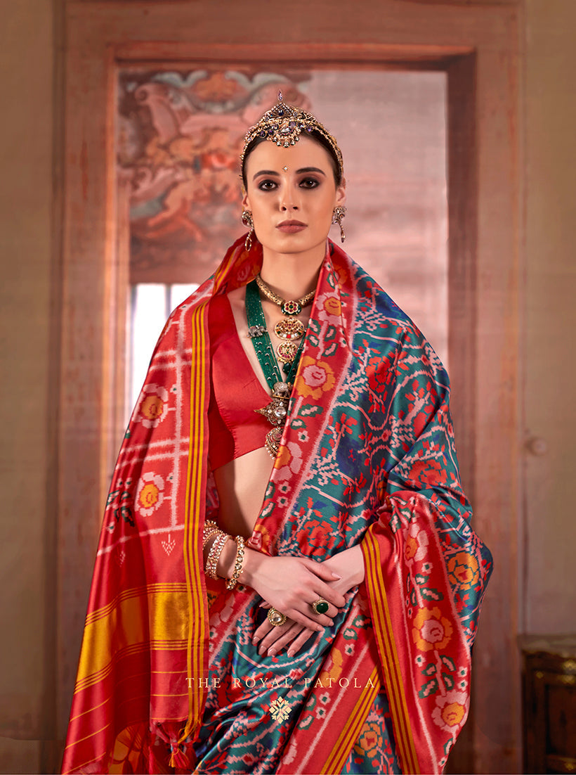 Teal Silk Blend Patola Print Saree with Contrast Red Blouse