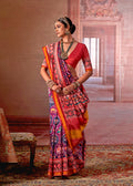 Multicolor silk blend saree with traditional Patola print for wedding and festive occasions