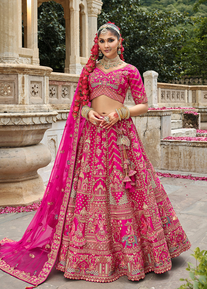 Rani pink bridal lehenga choli made from silk blend with detailed Khatli embroidery