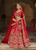 Red silk blend bridal lehenga choli featuring intricate Khatli embroidery