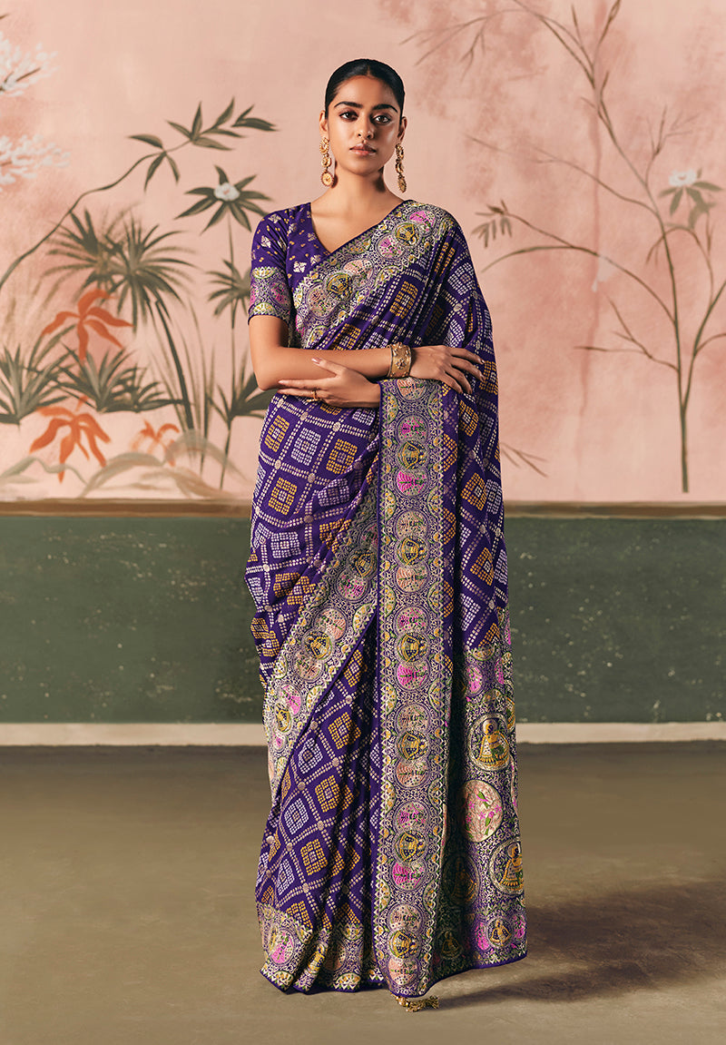 Violet faux khadi georgette saree with traditional Bandhej weaving patterns