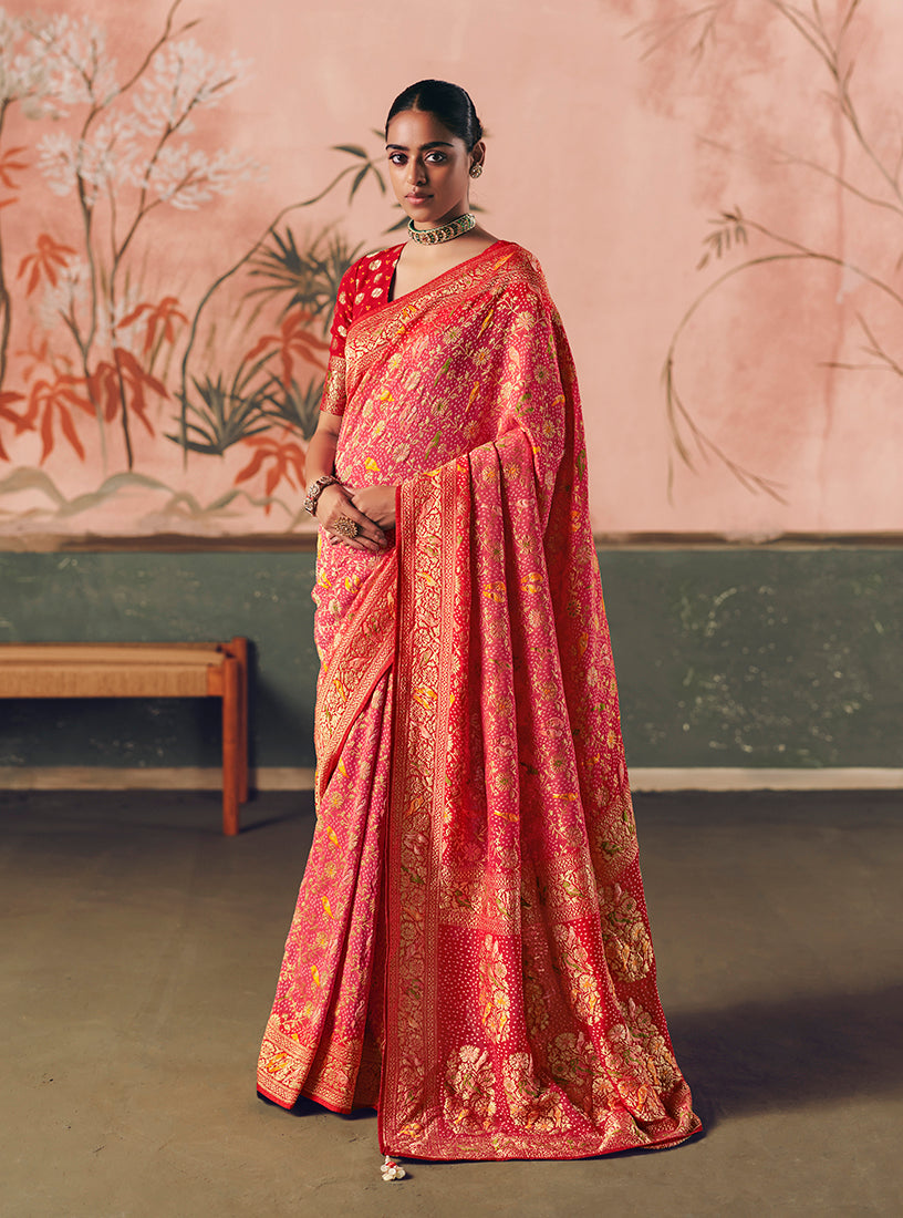 Gajri pink Bandhej saree in faux khadi georgette with traditional weaving work.