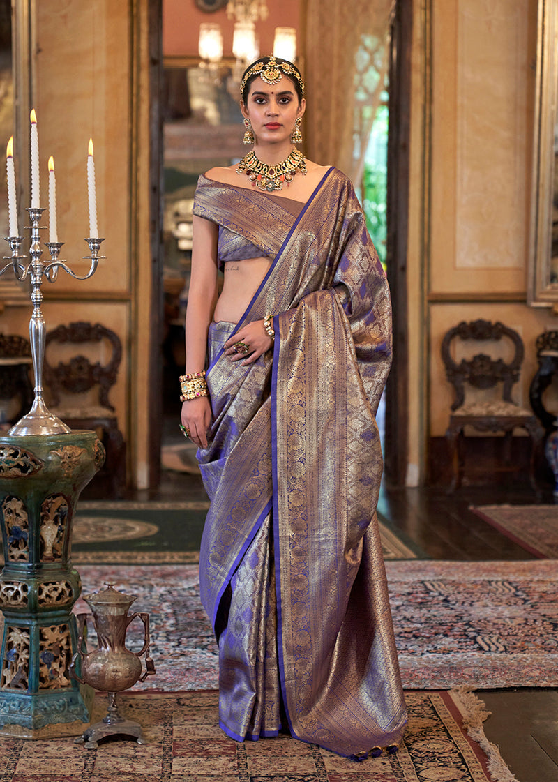 Violet Kanjivaram silk blend saree with gold woven work and matching blouse