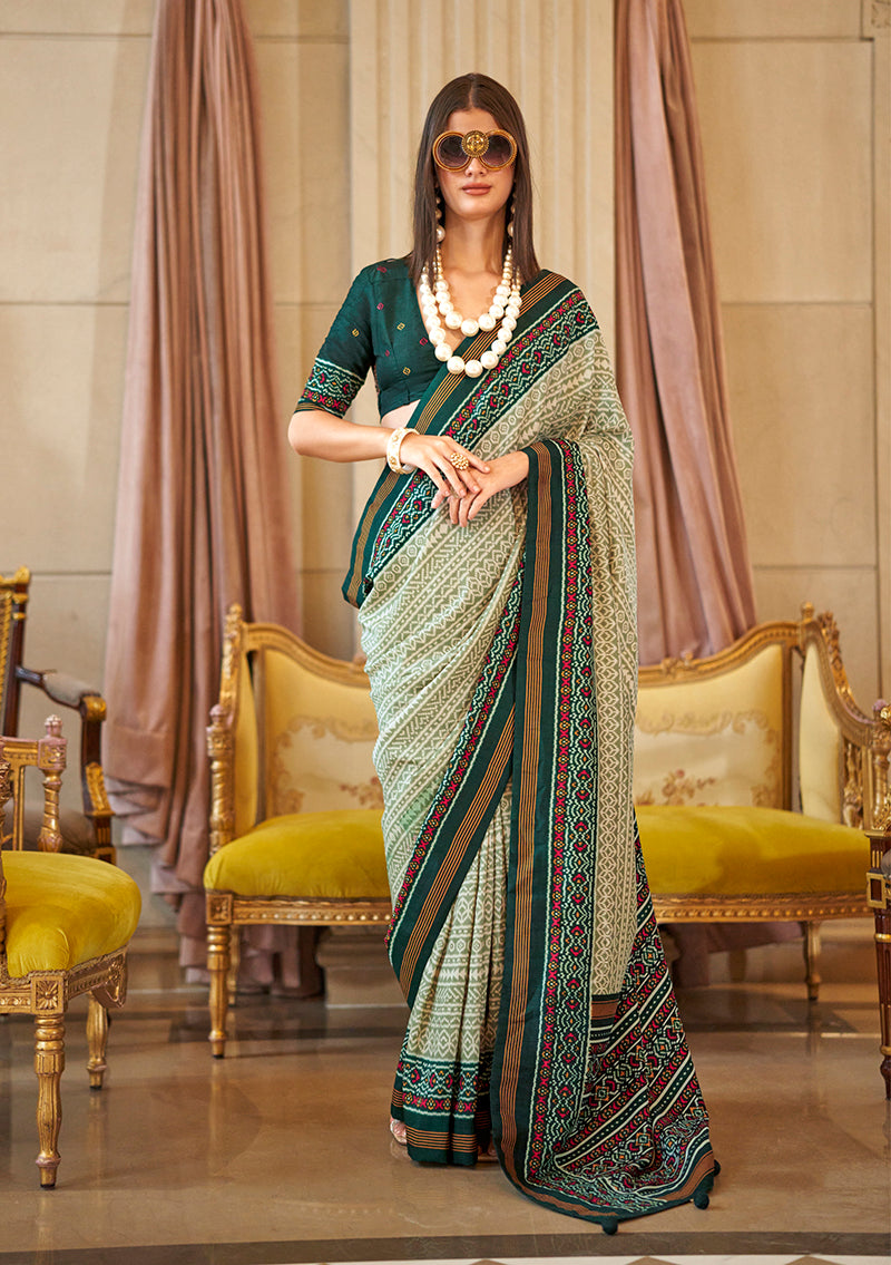 Contemporary green silk blend saree with abstract print for party wear