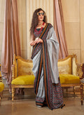 Elegant grey silk blend party saree with foil print detailing