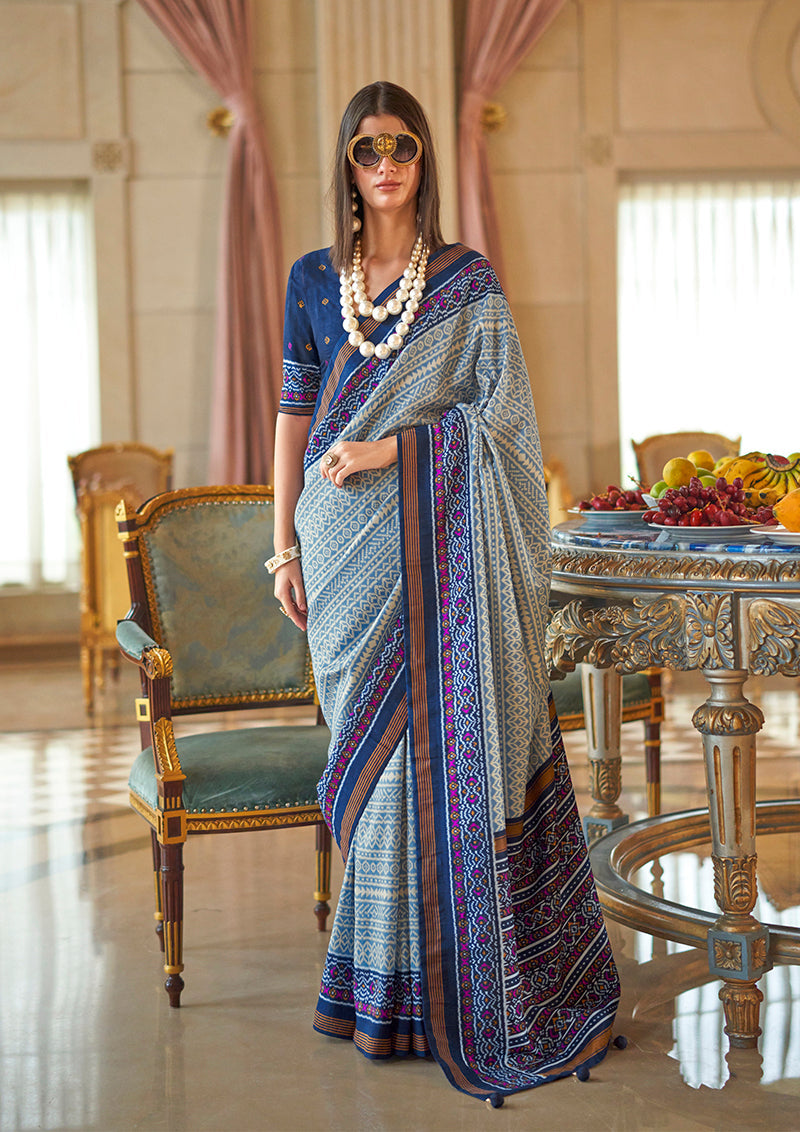Light blue contemporary silk blend saree with intricate foil print work for party wear