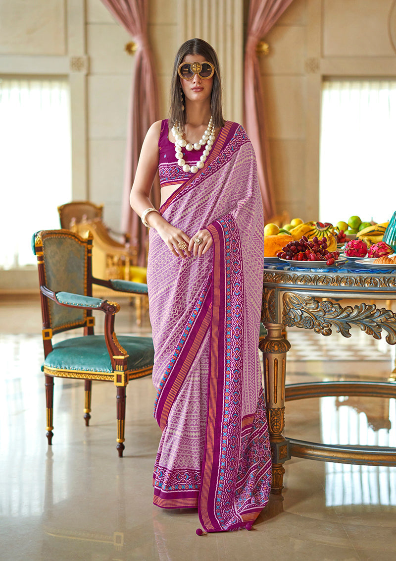 A magenta silk blend contemporary saree with elegant foil print detailing.