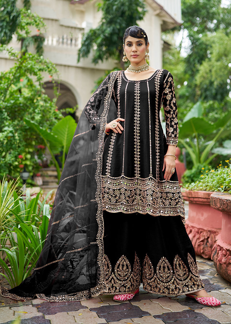 Black Chinnon palazzo kameez with intricate embroidery and mirror work