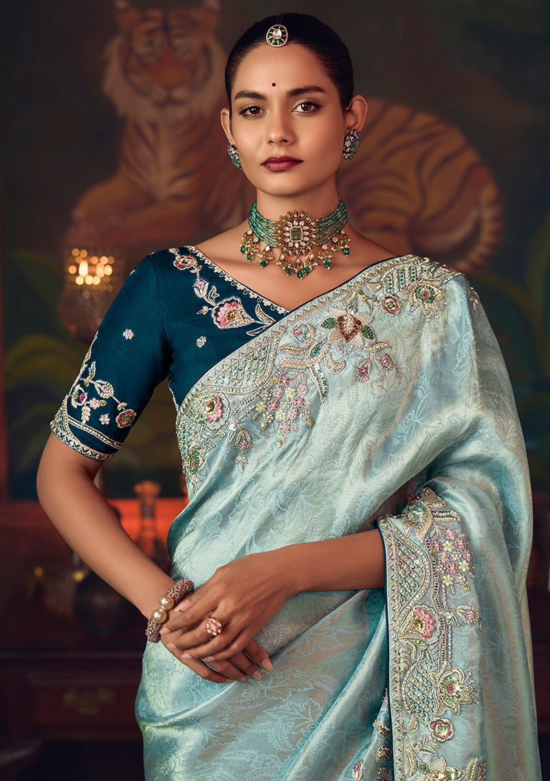 Monjolika Fashion Sky Blue Zari Woven Silk Blend Embroidered Saree For Wedding Wear
