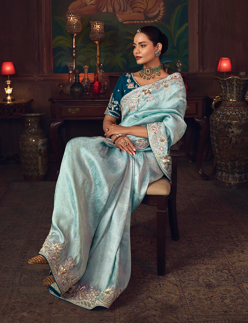 Monjolika Fashion Sky Blue Zari Woven Silk Blend Embroidered Saree For Wedding Wear