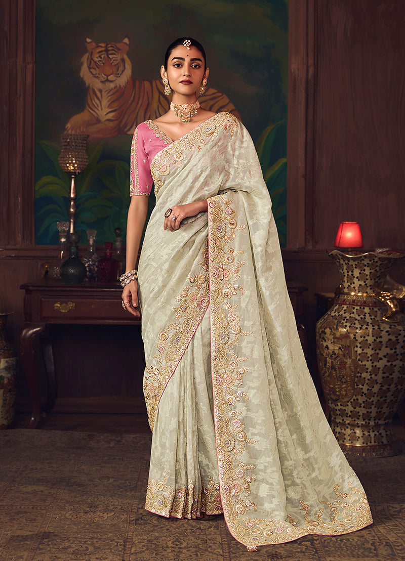 Monjolika Fashion Off White Zari Woven Silk Blend Embroidered Saree For Wedding Wear