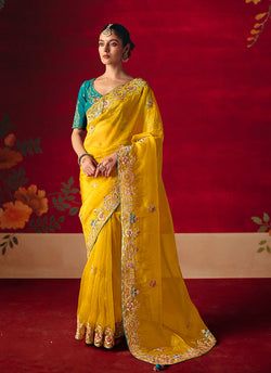 Bright yellow fancy fabric saree with sequin and thread embroidery