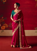 Rani Pink fancy fabric saree with detailed sequins and embroidery thread work