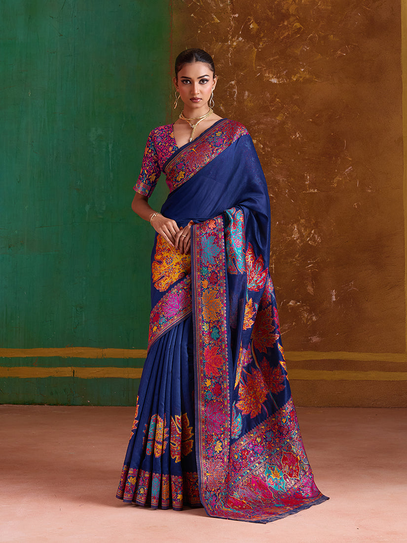 A stylish navy blue cotton blend saree with contemporary weaving patterns.