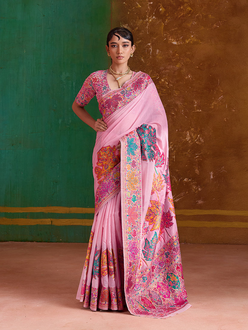 A beautiful pink cotton blend contemporary saree with intricate weaving patterns and a matching blouse.