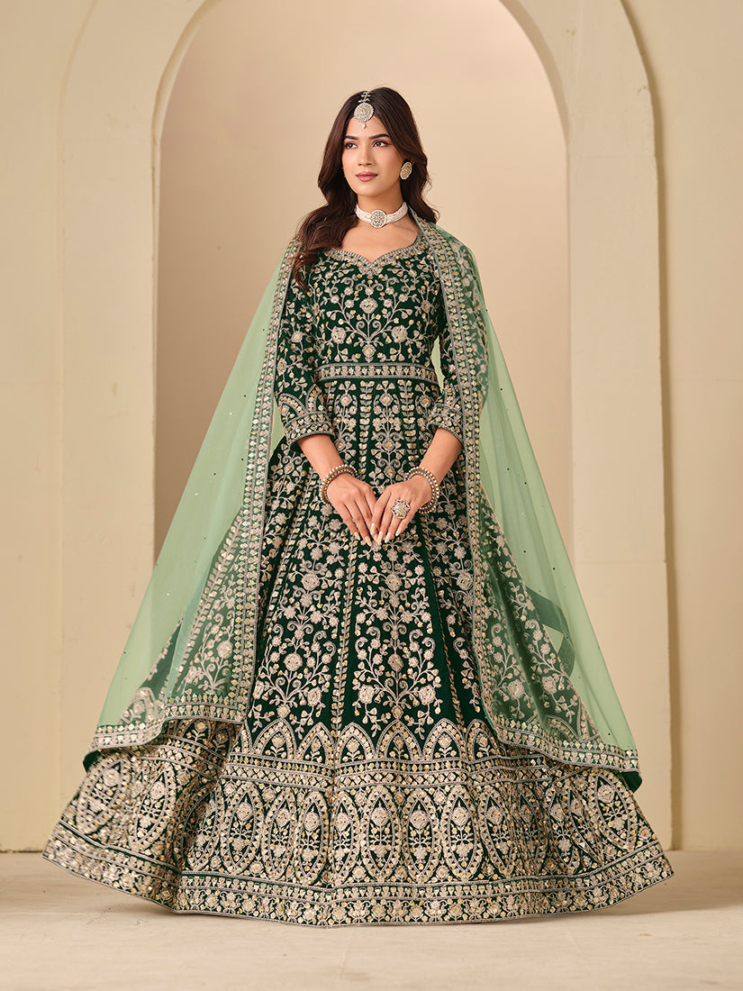 Dark green velvet Anarkali suit with intricate embroidery for engagement wear