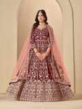 Elegant maroon velvet Anarkali suit with intricate embroidery for engagement ceremonies