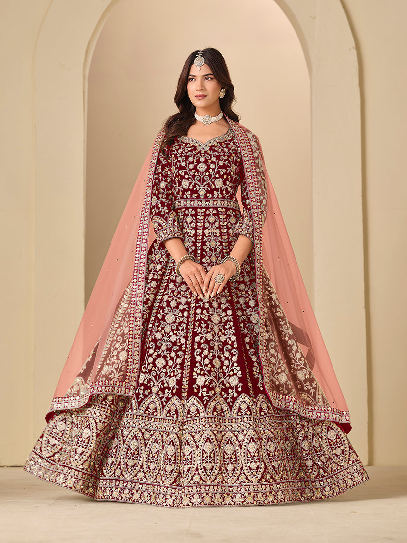 Elegant maroon velvet Anarkali suit with intricate embroidery for engagement ceremonies
