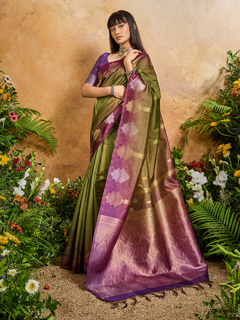 Woman draped in an olive green contemporary handloom silk blend saree with intricate weaving work