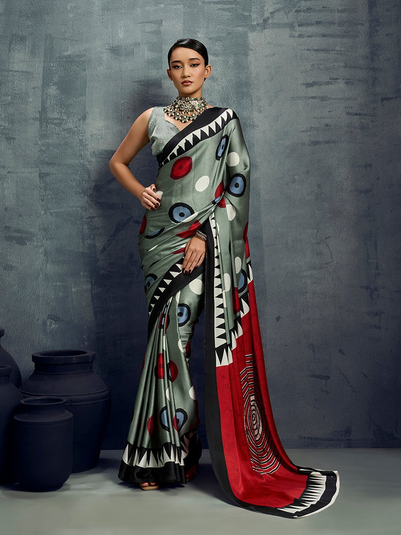 Grey satin saree featuring a sophisticated printed pattern and soft, lustrous finish