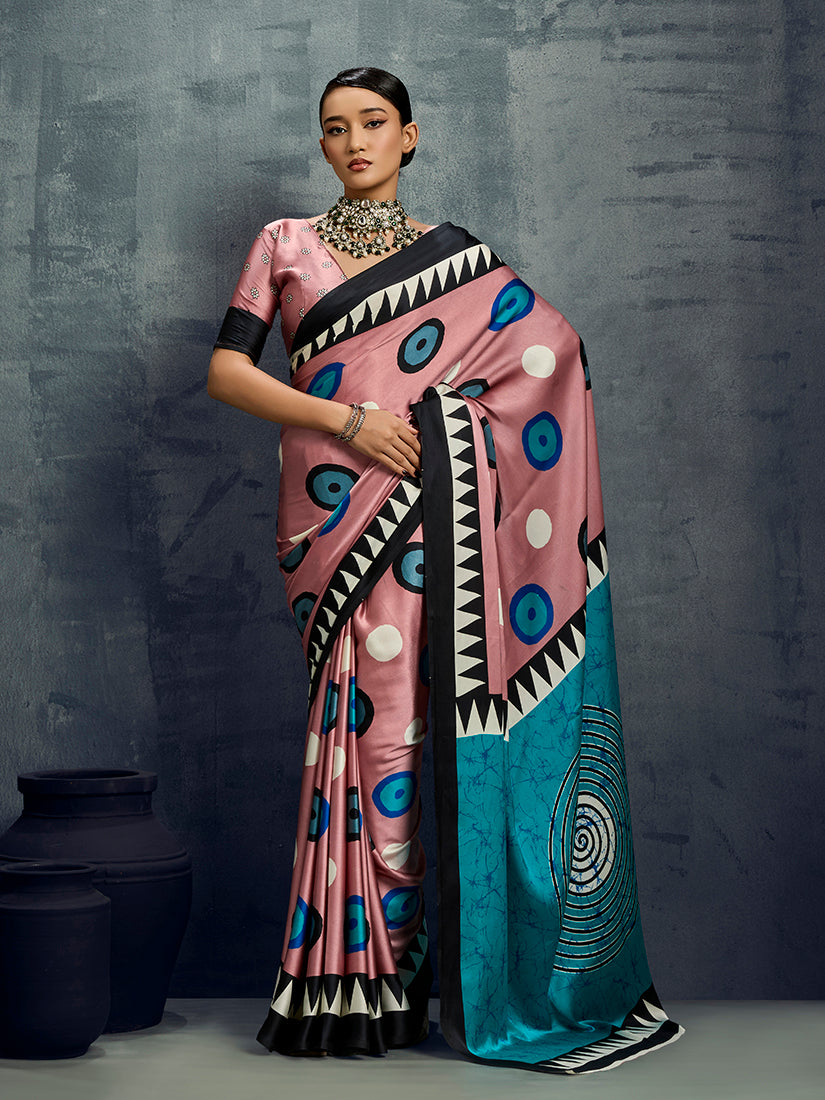 Light pink satin saree with chic prints, displayed with a matching blouse.