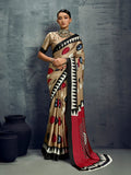 Elegant Chiku colored satin saree with artistic print work