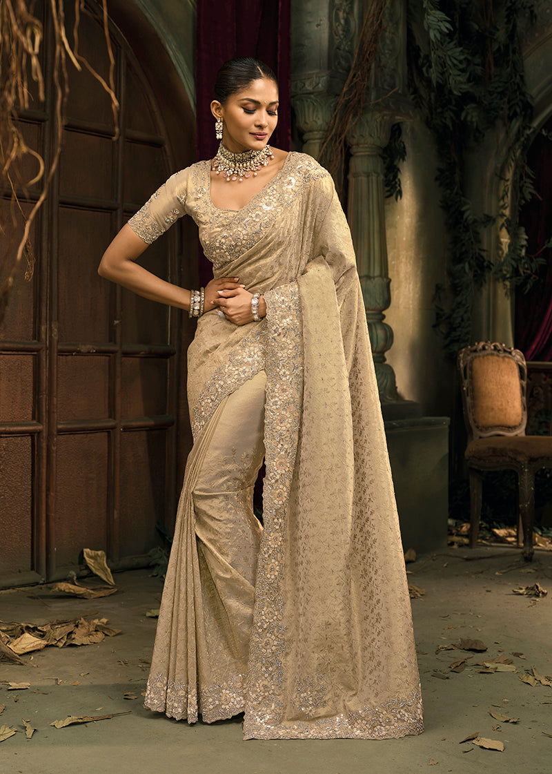 Cream silk blend wedding saree with detailed Zari, Moti and Cut Dana embroidery